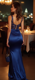 Chic satin evening dress with an open lace back, buttoned details, and a figure-hugging silhouette – perfect for glamorous evenings and formal gatherings. | فستان سهرة أنيق بظهر دانتيل مفتوح وتفاصيل أزرار لمظهر فاخر وأنيق | Vestido de noche con espalda de encaje y corte ajustado – sofisticado y moderno. | Robe de soirée dos en dentelle avec boutons et coupe ajustée – parfaite pour une élégance intemporelle.